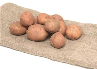 Potatoes on burlap bag