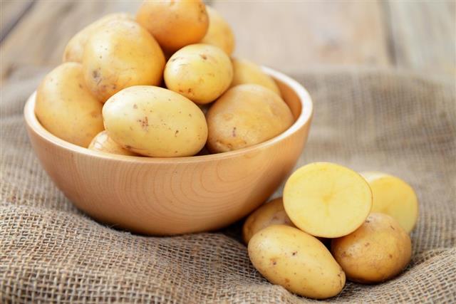 Raw Potatoes in Bowl