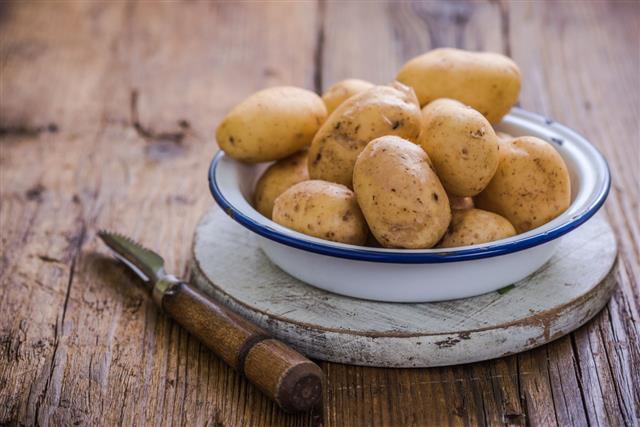 Young Potatoes In Rustic Bowl