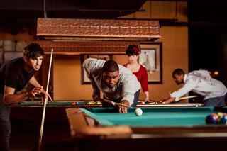 Friends Playing Pool