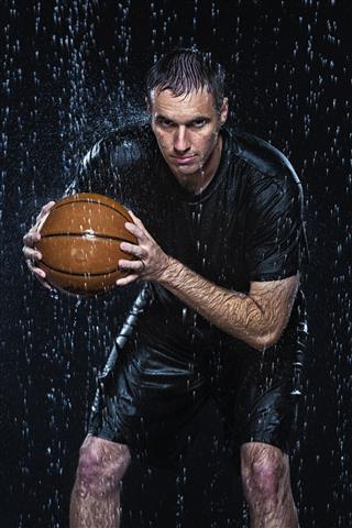 Basketball Player In The Rain