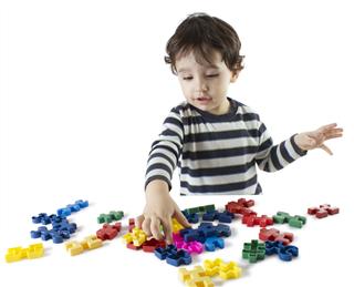 Boy Playing Puzzle