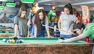 Friends Playing Pool Game
