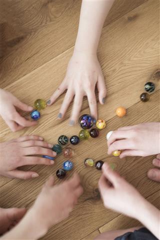 Kids Playing Marbles