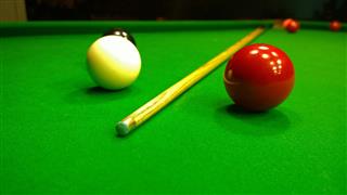 Cue And Snooker Balls On Table