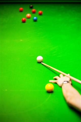 Playing Snooker And Aiming White Ball