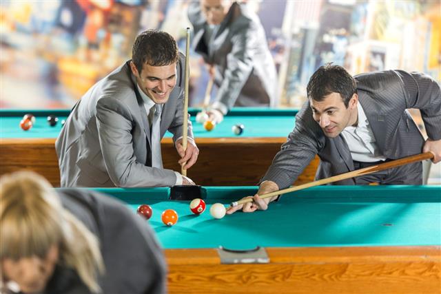 Businessmen Playing Billiard