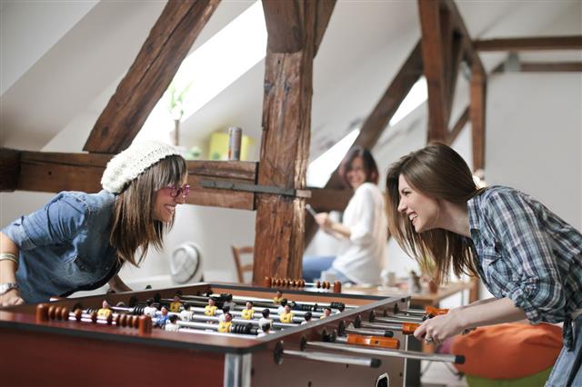 Office Workers Playing Table Football