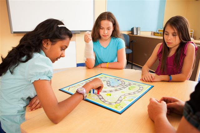 Girls Playing An Educational Game