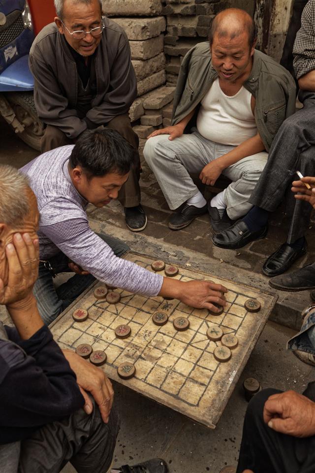 Men Playing Traditional Game