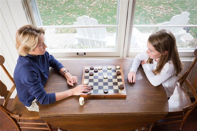 Kids Playing Checkers Chess