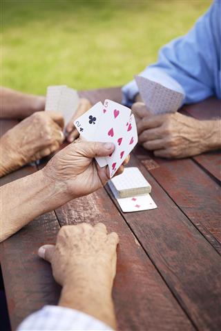 Older People Playing Cards