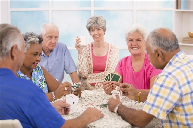 Senior Adult Friends Playing Cards