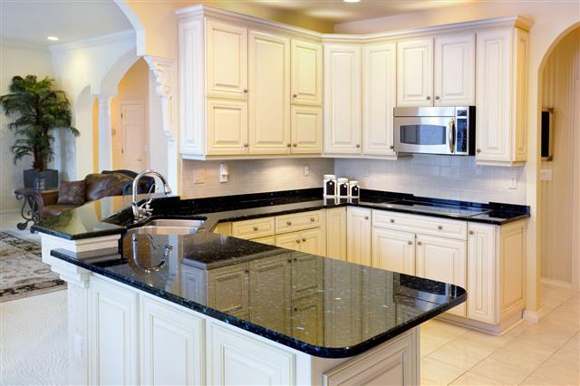 Bright Kitchen With Granite Counters