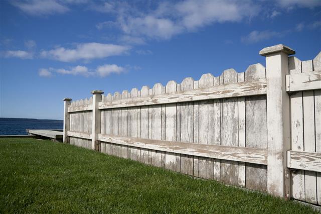 Old Worn White Fence