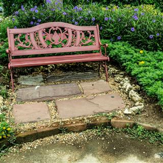 Park Bench With Colorful Flowers