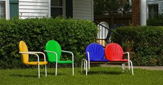 Multi Colored Chairs In Yard
