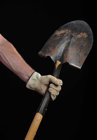 Hand With A Shovel