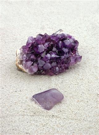 Purple Crystals On Sand