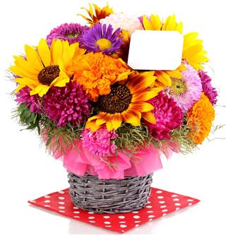 Bright flowers with paper note
