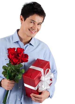 man holding Gift Box and roses