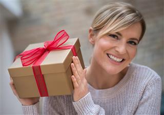 Woman holding present