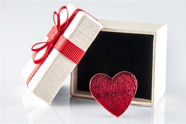 Heart and opened gift box