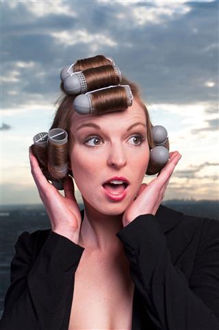 Fashion Model With Hair Curlers
