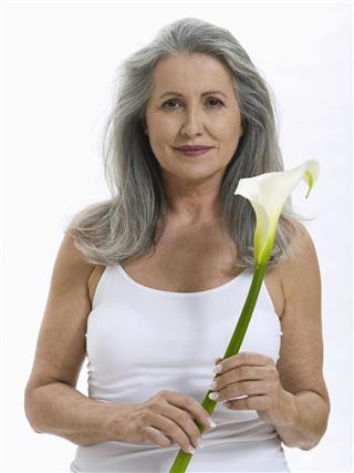 Senior Woman Holding Flower