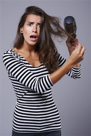 Woman Worried Because Of Hair Damage