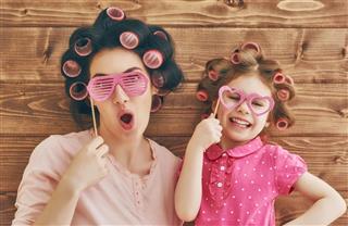 Mother And Daughter With Curlers