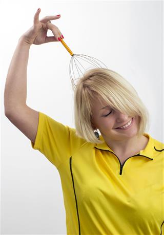 Woman With Head Massage Tool