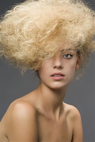 Woman With Frizzy Hairstyle