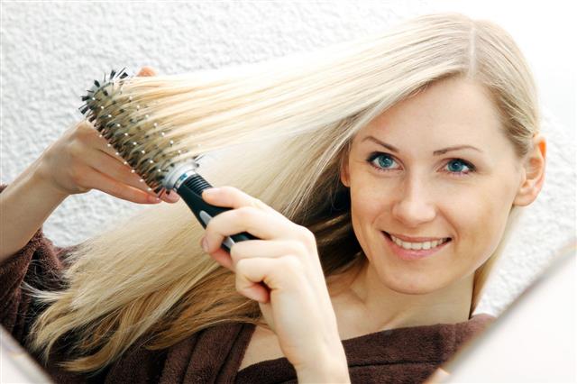 Woman Brushing Her Long Hair