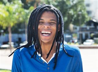 Laughing Guy With Dreadlocks