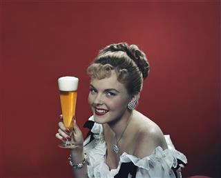 Woman Holding Beer Glass