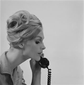Young Woman Talking On Phone