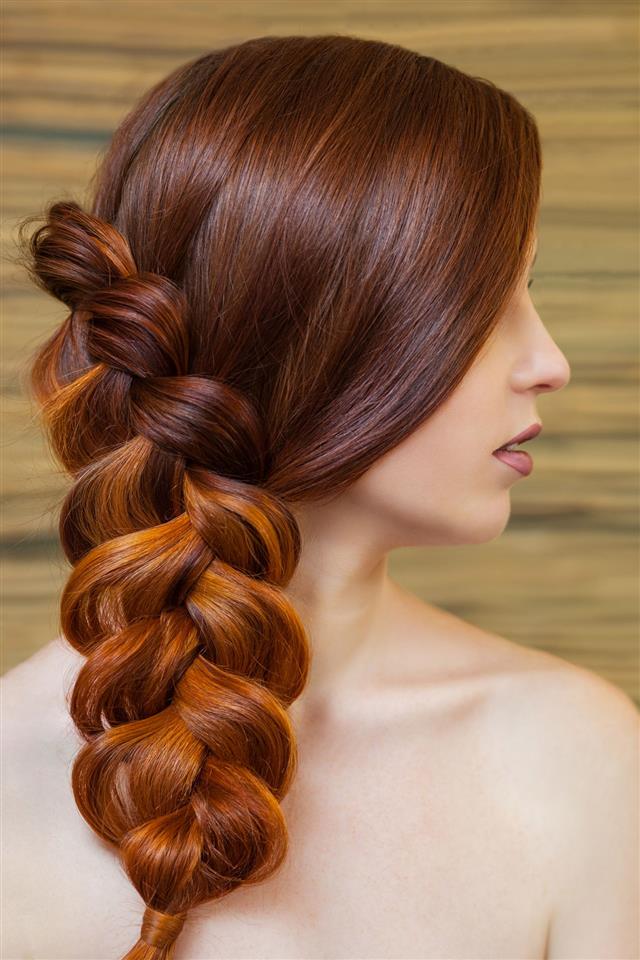Girl With Long Red Hair Braided