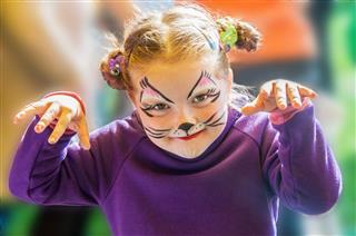 Funny Little Girl With Painted Face