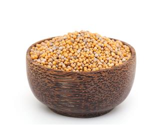 Mustard Seeds In A Wooden Bowl