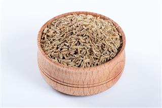 Cumin Seeds Or Caraway In A Wooden Bowl