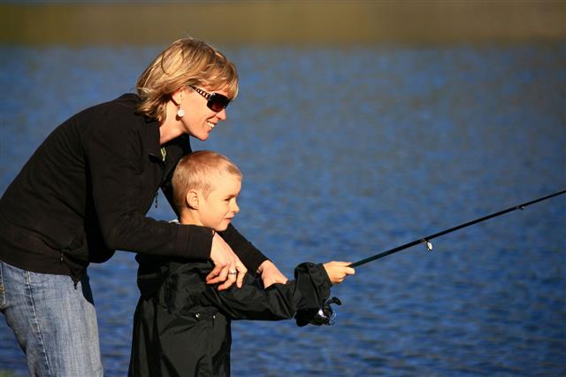 Mother And Child Fishing