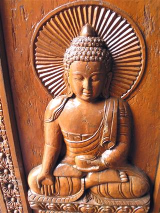 Buddha Carving On A Temple Door