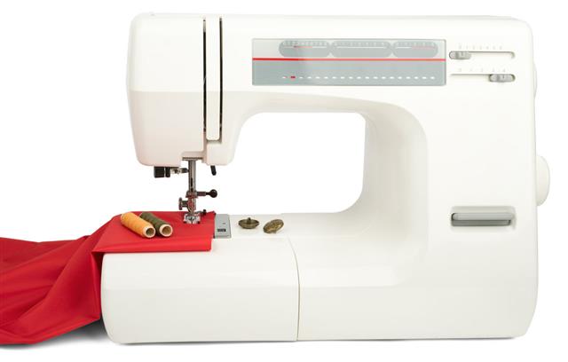 Sewing Machine And Red Fabric