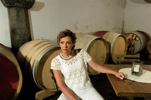 Woman In Old Wine Cellar