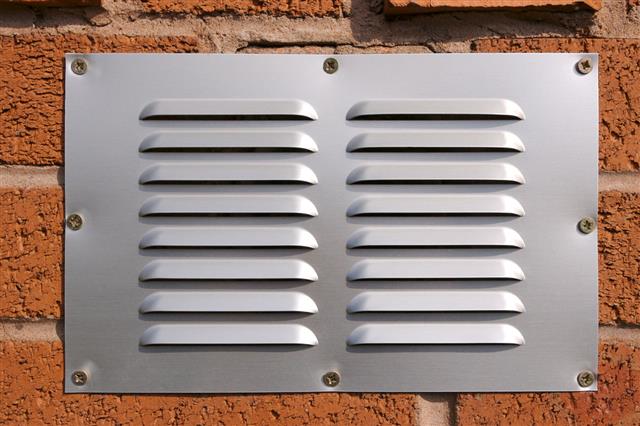 Brick Wall And Ventilation Grille