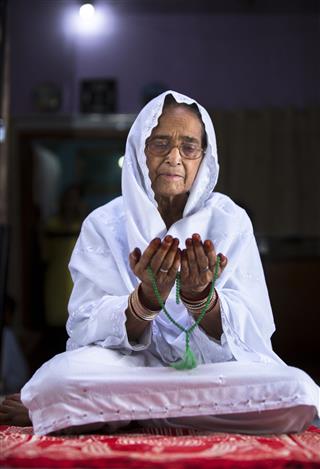 Senior Muslim Woman Praying
