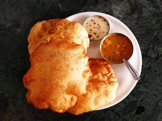 Indian Breakfast Poori Curry And Chutney