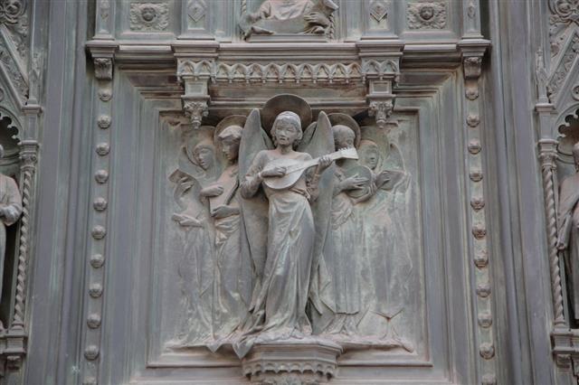 Sculpture On Entrance Of Florence Duomo Italy