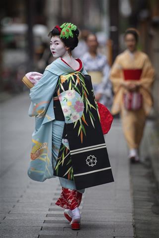 Geisha On Street In Kyoto Japan
